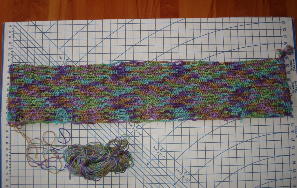 Top portion of the crochet top folded over to create the bodice.